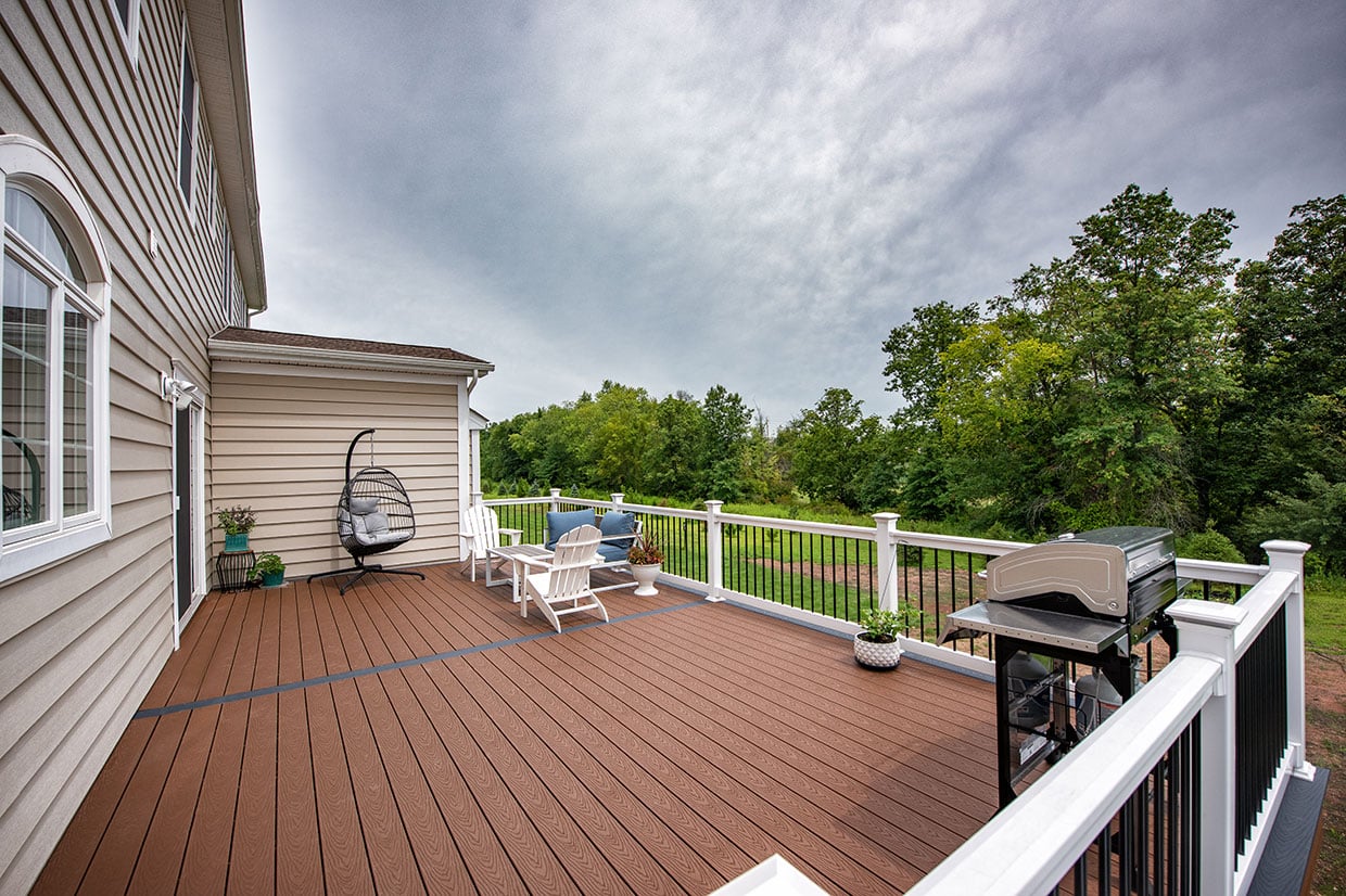 Composite Deck With Vinyl Railings And Under Deck Finishes In Summit 2