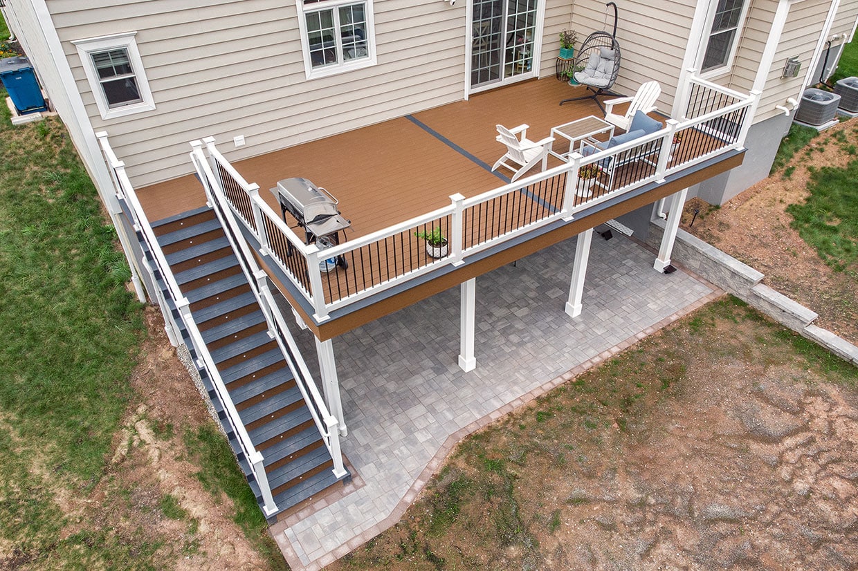 Composite Deck With Vinyl Railings And Under Deck Finishes In Summit 4
