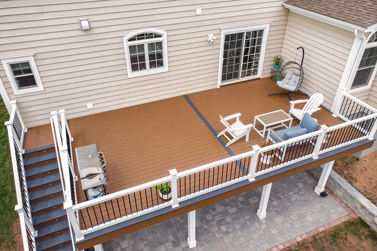 Composite Deck With Vinyl Railings And Under Deck Finishes In Summit 8