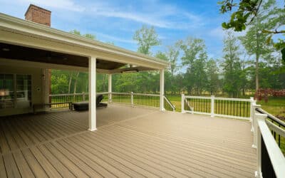 Large Composite Deck With Vinyl Railings and A-frame Open Porch With Natural Tone Wood Ceiling